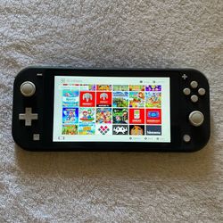 NINTENDO SWITCH LITE with 120 SWITCH GAMES