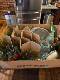 Vintage coke and soda bottles