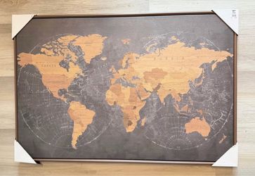 Large 30” x 40” world map wall art with a brown frame