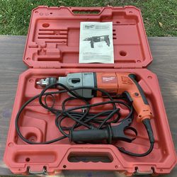 Milwaukee 1/2” Hammer Drill with case.