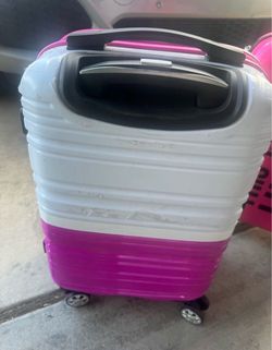 Pink/white luggage
