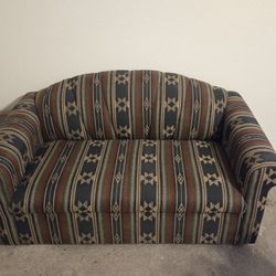 Matching Love Seat/Couch (Hide-a-bed) pair.