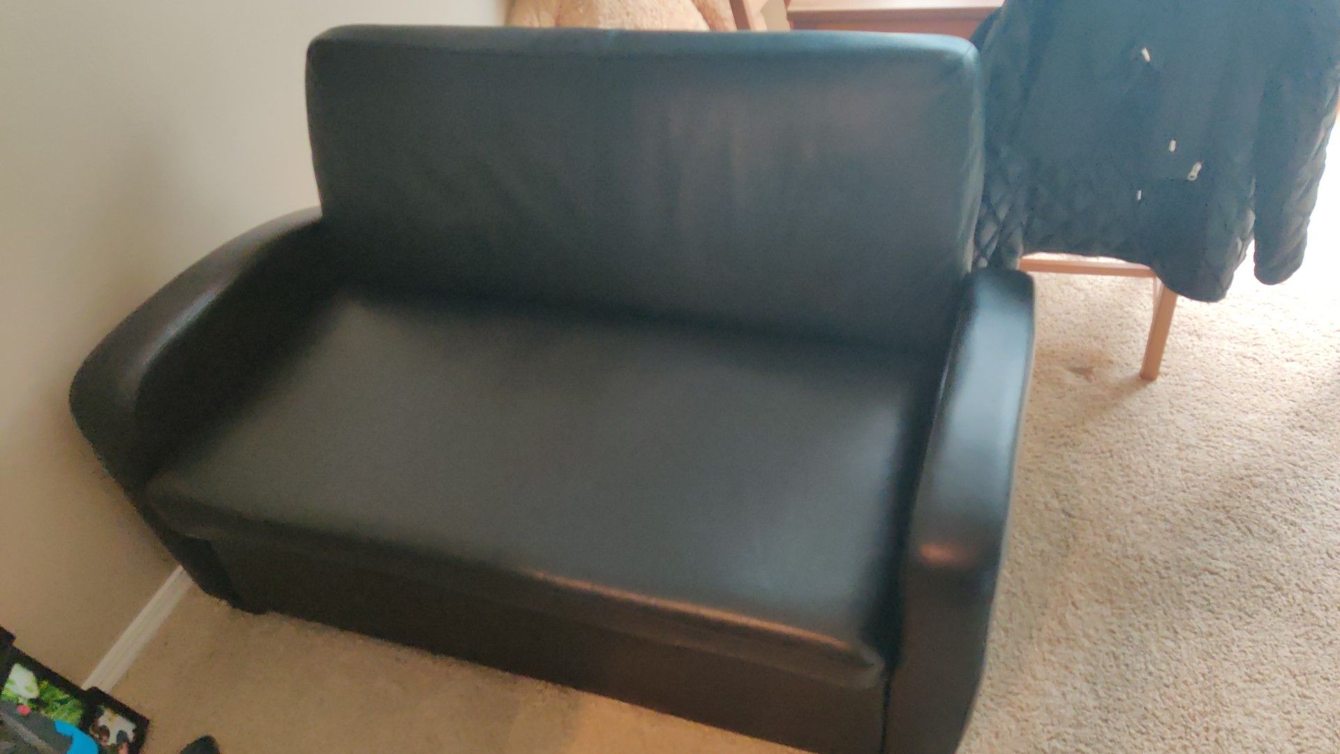 Black leather futon gone asap