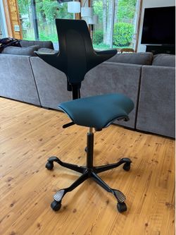 HÅG Capisco Puls Ergonomic Office Chair, designed by Peter Opsvik.