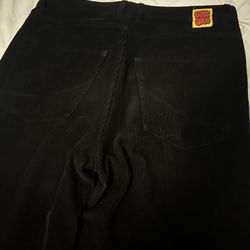 empire pants worn 2 times no cuts no nothing clean and baggy size 32