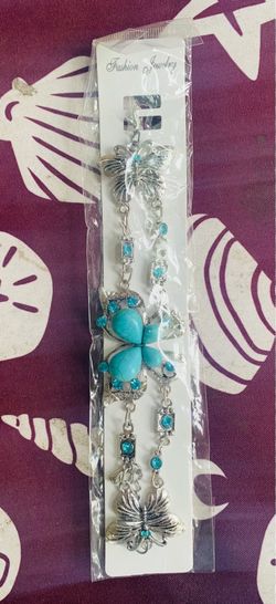 Brand silver-tone butterfly fantasy bracelets featuring turquoise-colored stones and blue crystals