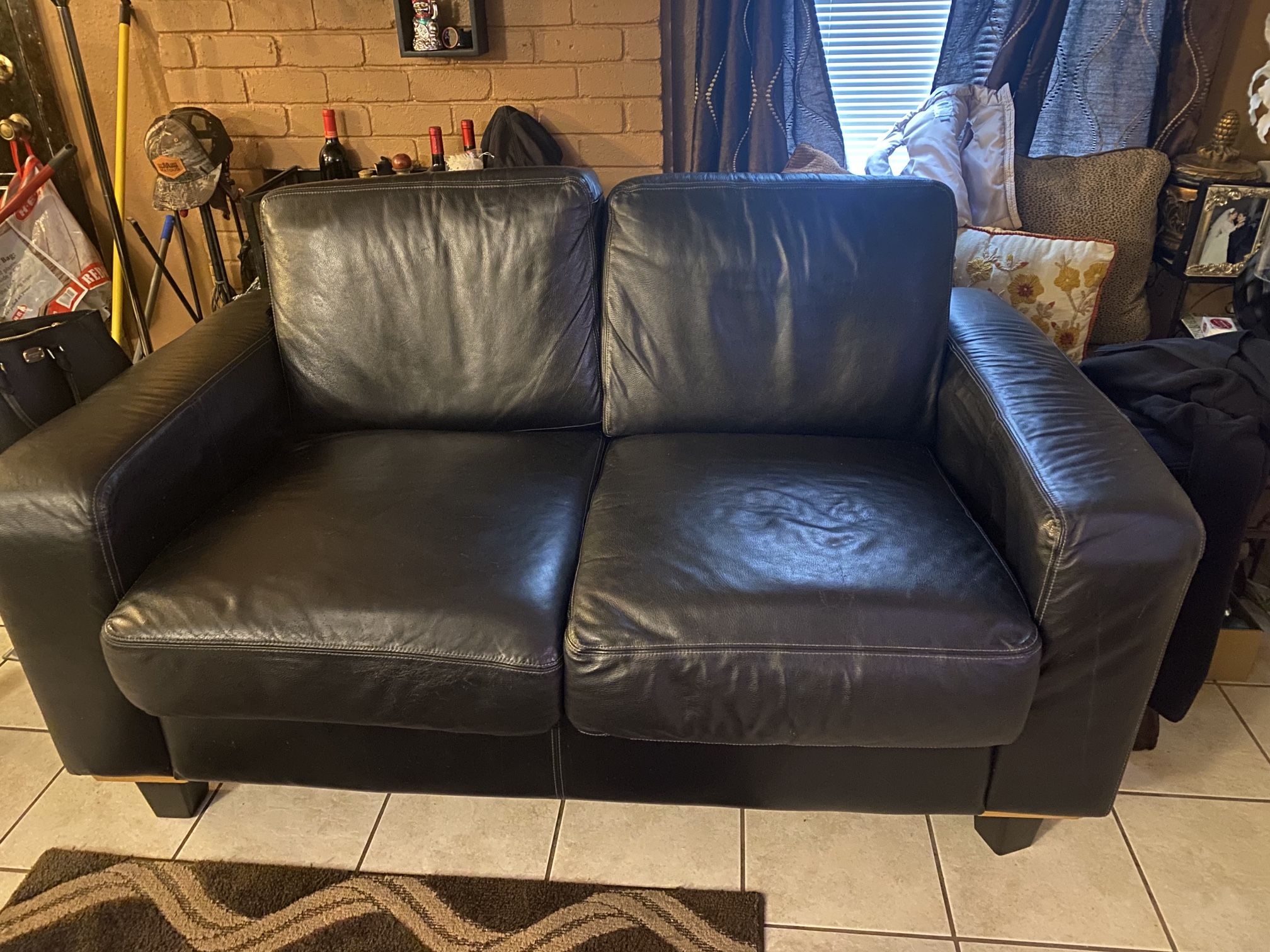 Black leather couches