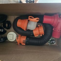 RV Sewer line hose hose stand holder caps accessories