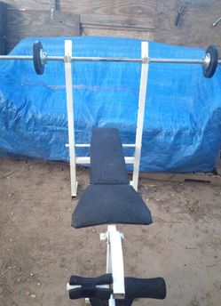 Set para levantar pesas incluye barra y 3 pesas $35.00