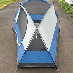 Backpacking package with tent, dishes, and sleeping bag