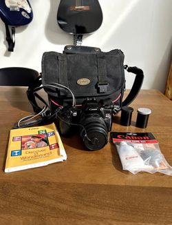 Canon EOS Rebel X S 35mm film camera Canon Zoom Lens EF 35-80mm