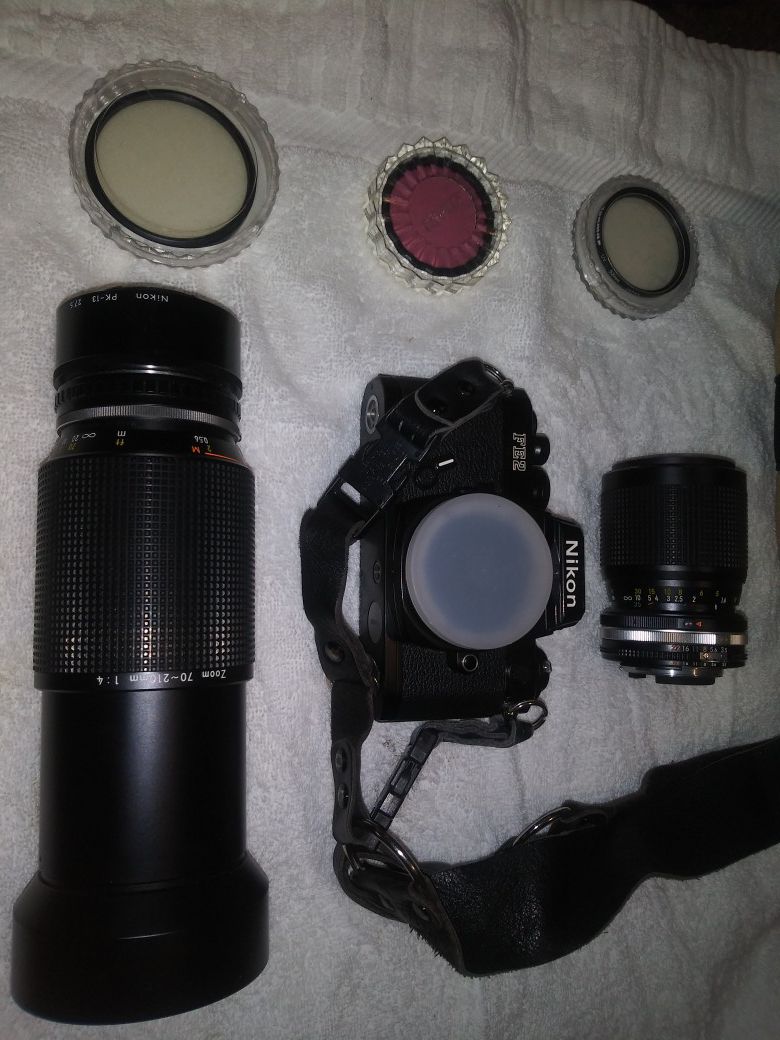 Nikon FE-2 w 2 lenses and a case. Works very well. Open to trades involving car audio amplifiers, music equipment or instruments