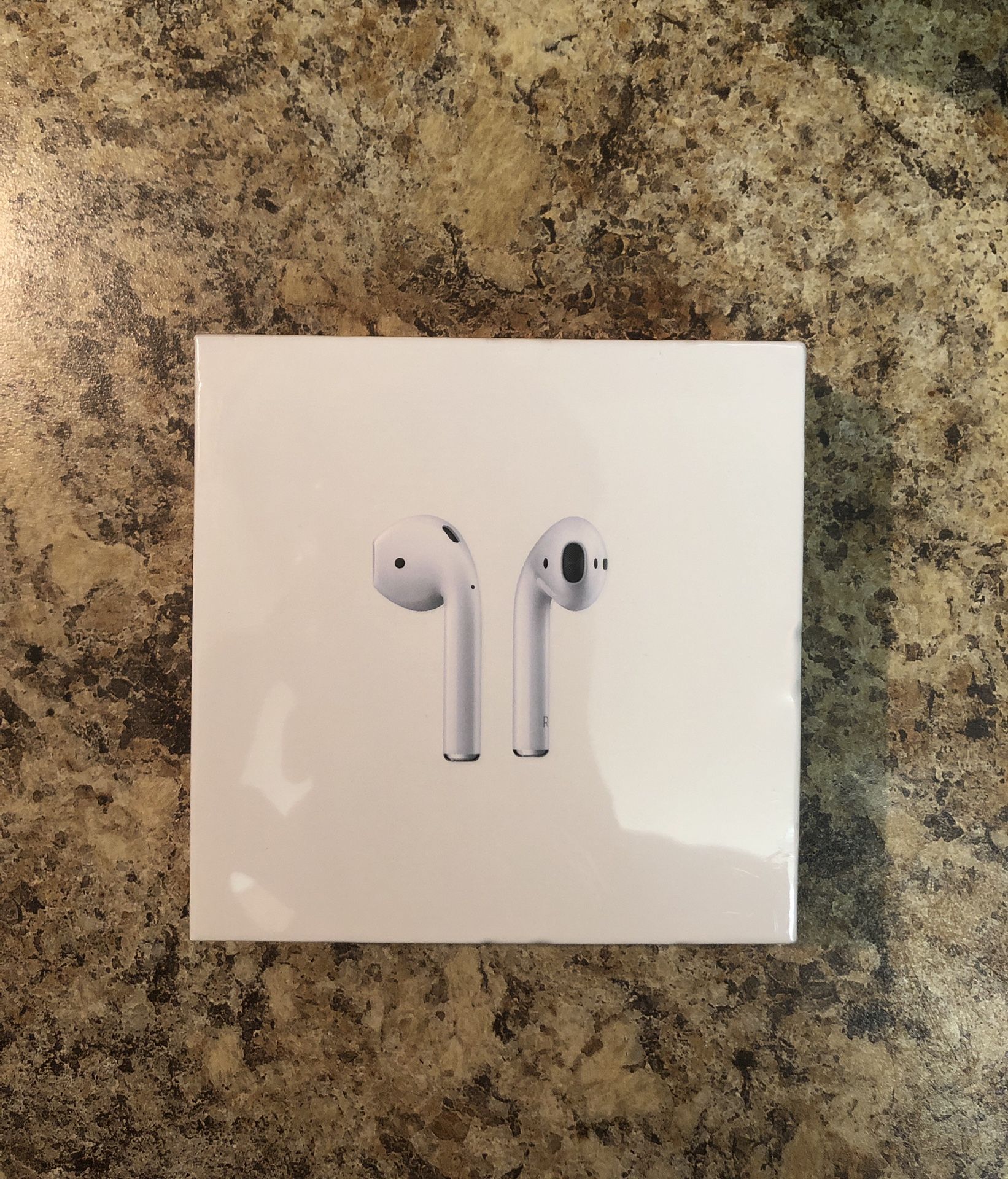 Apple AirPods 2nd Gen Wireless Earbuds With Wireless Charging Case