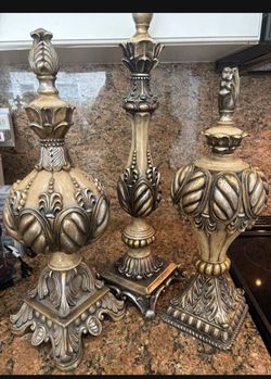 Decorative set of 3 ornate resin finial statues. Classic antique finish, detailed carvings. Tallest piece 19 inches high, two shorter ones 17 inches h