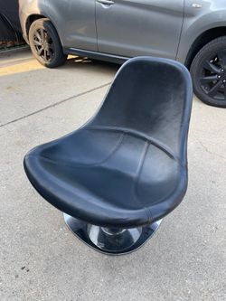 Black leather swivel chair.