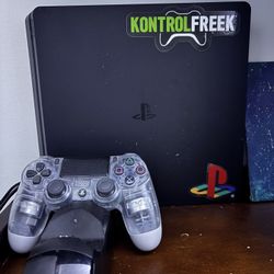 PS4 With Games, Controllers, And Controller Charger Dock.