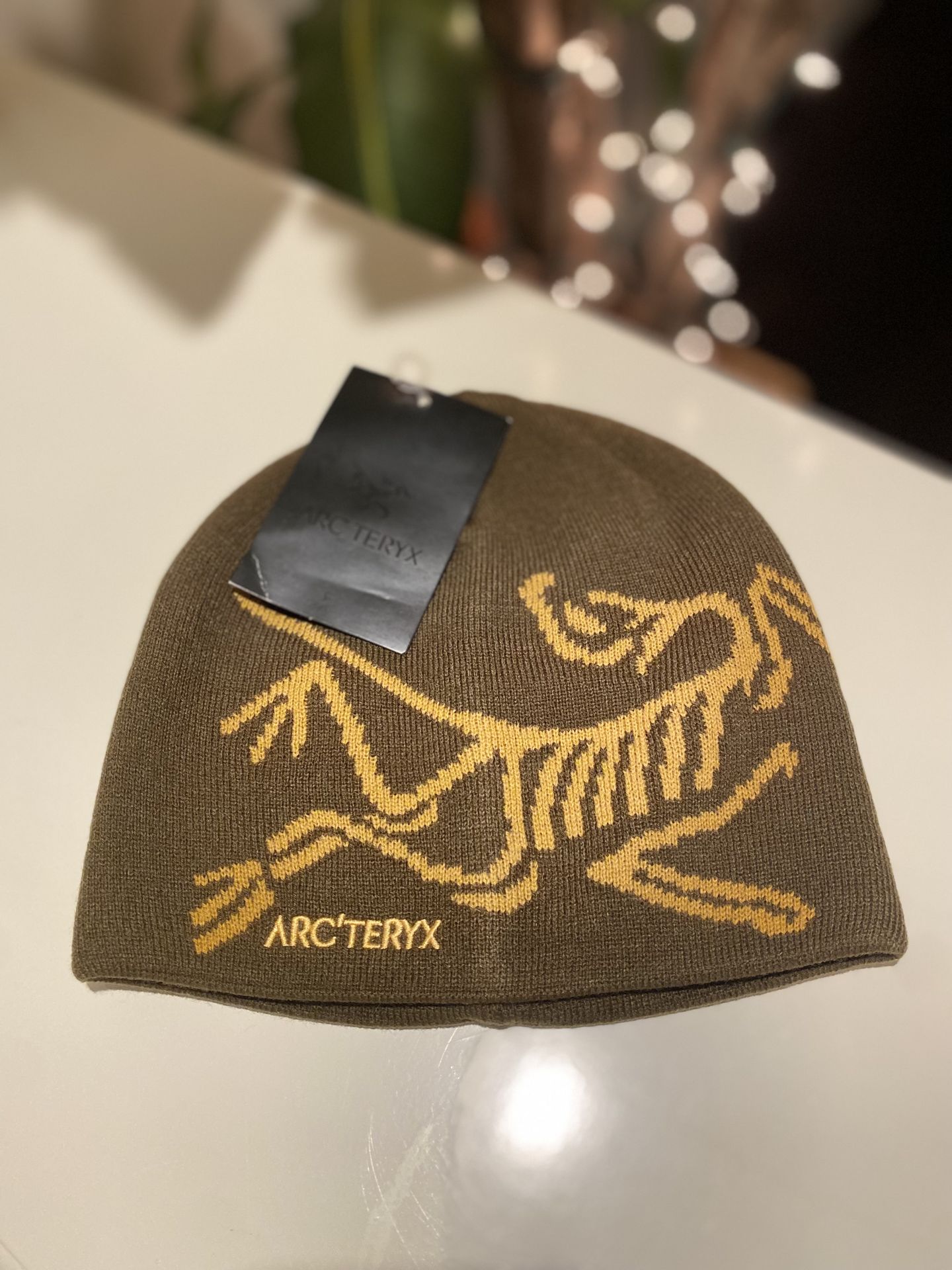 Brown arc’teryx beanie