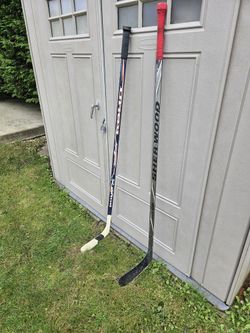 Right Hand Hockey Sticks and Gloves