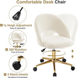 White swivel office chair with gold accent