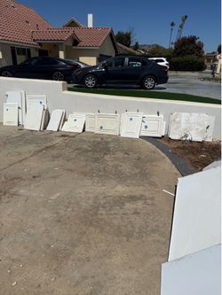 FREE cabinet doors.  FREE wood for burning.