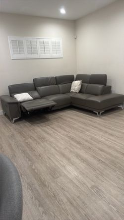 Italian leathere sectional reclining couch