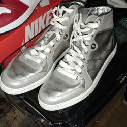 Silver hightop Gucci sneakers