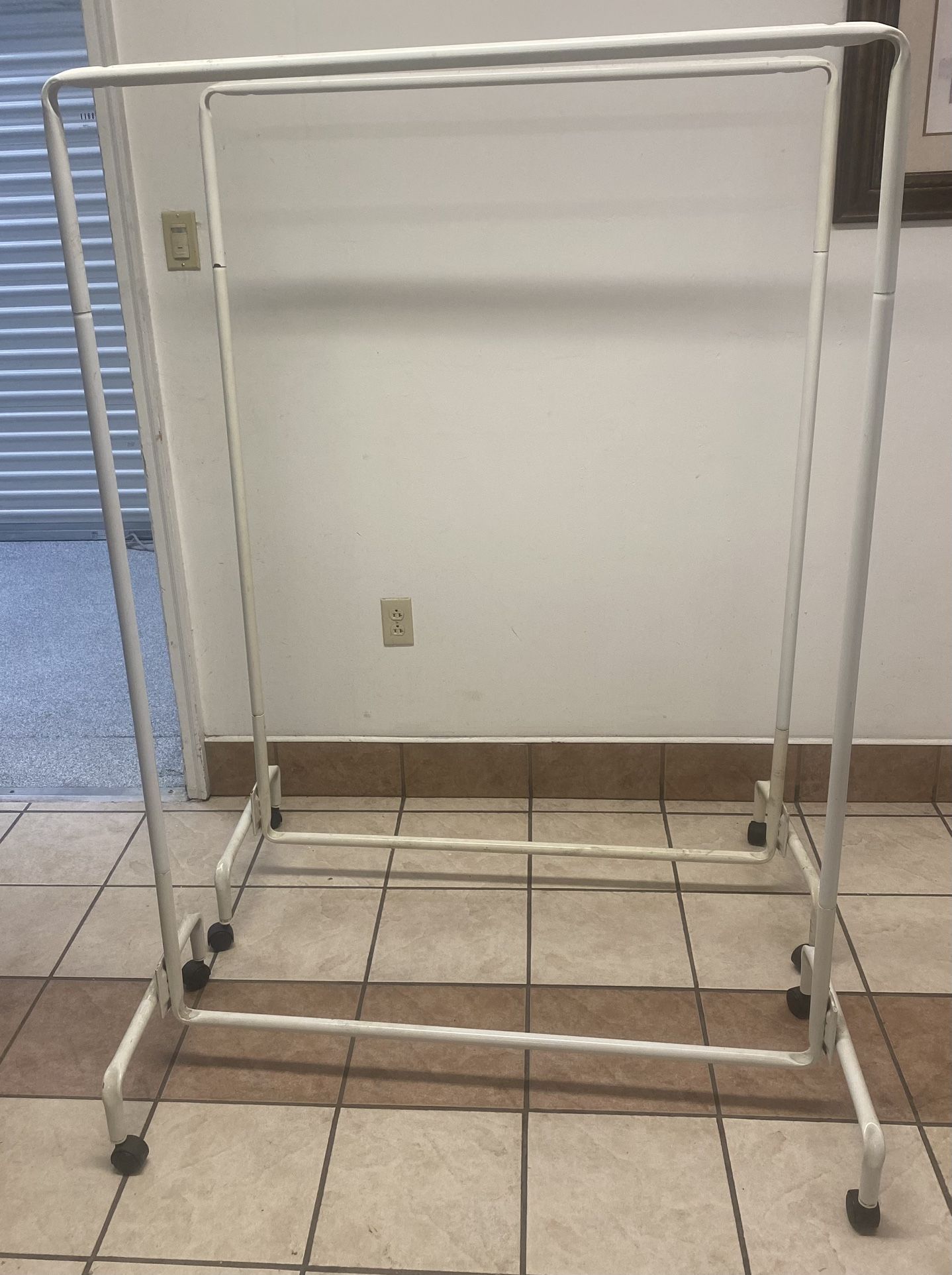 2 Clothes Racks On Wheels