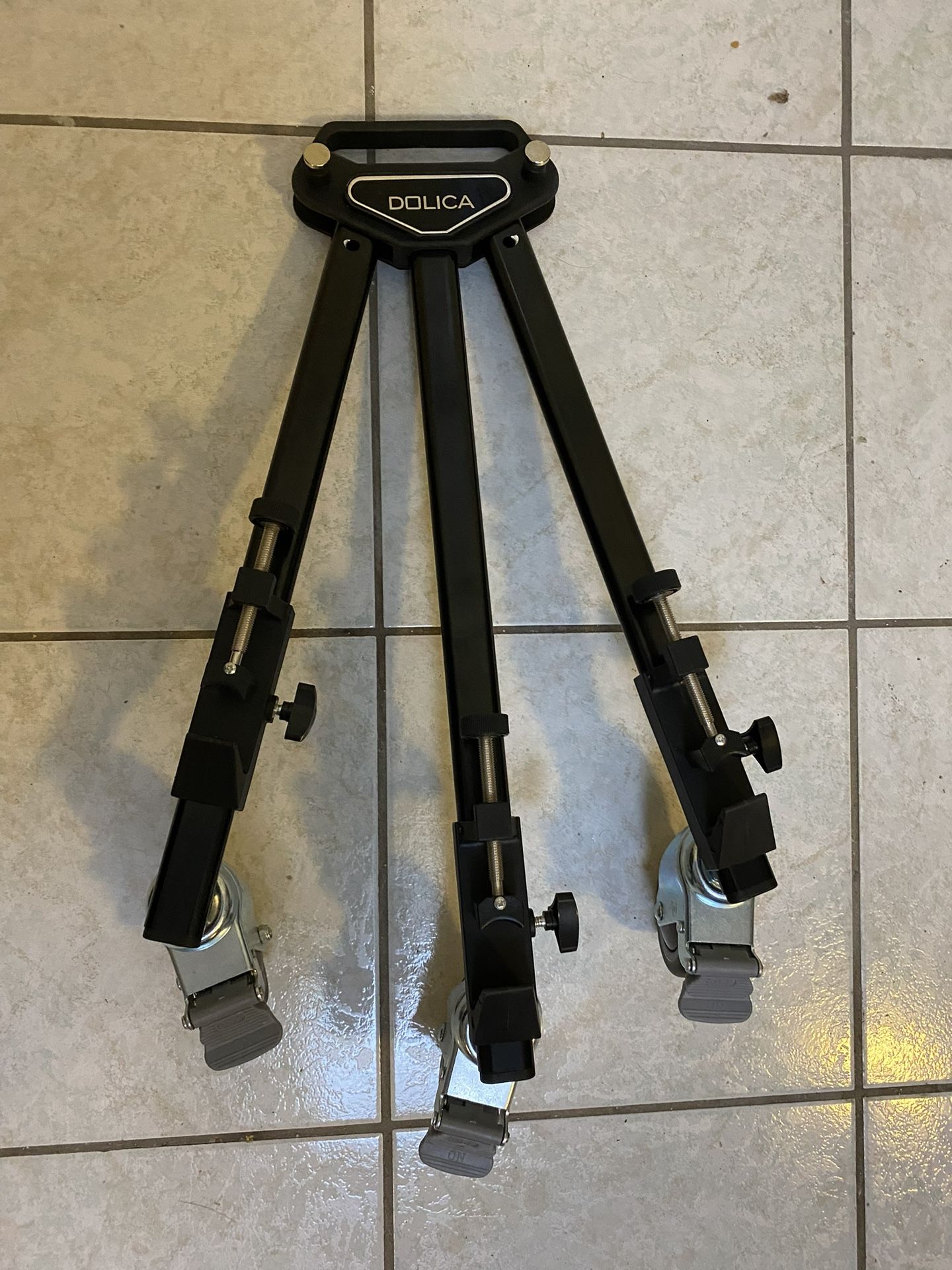 Tripod dolly - Dolica LT-D100 pro lightweight and heavy duty with adjustable leg mounts - Black Used $40