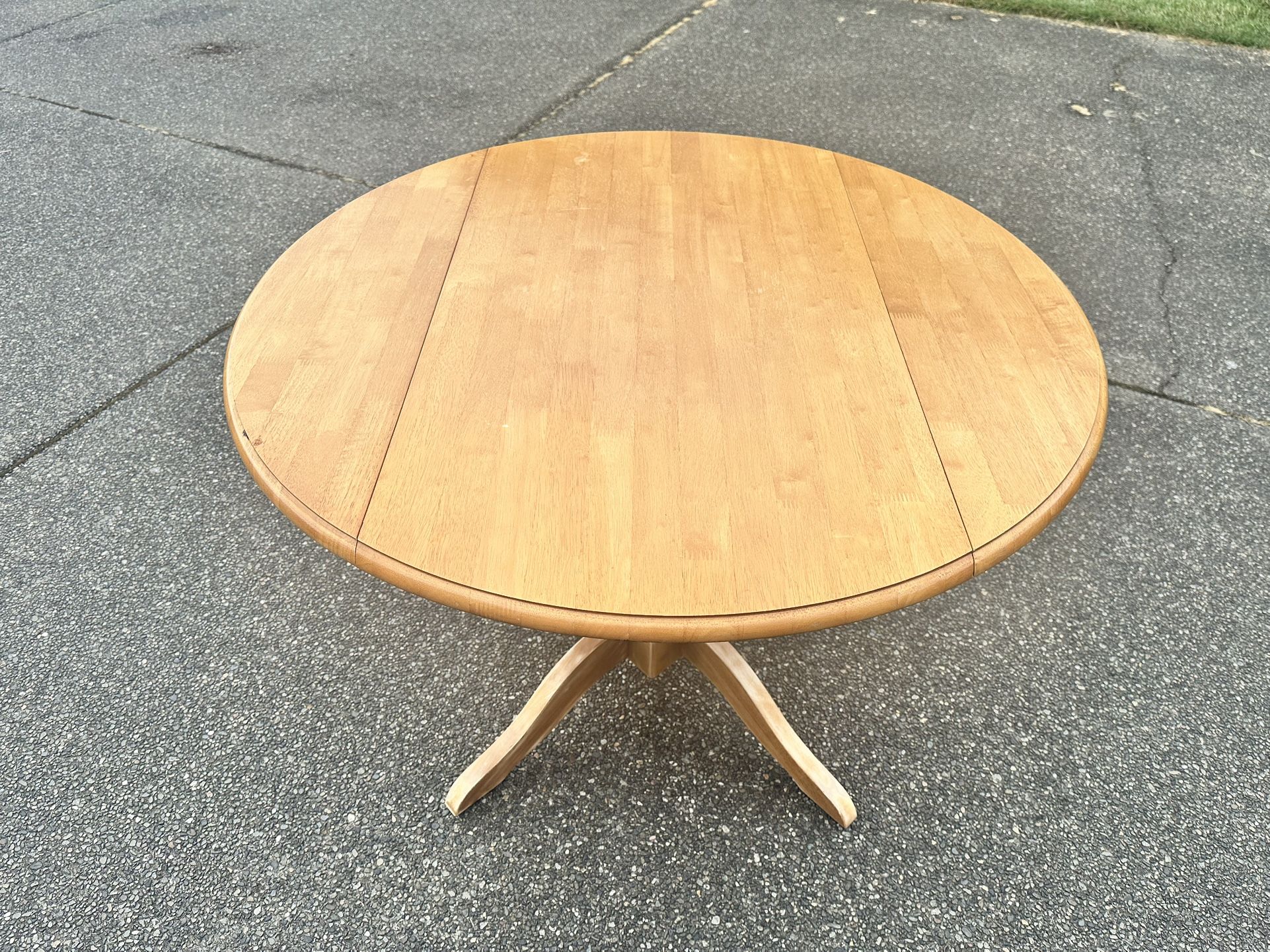Round Wooden Table With Dropped Leaf Sides