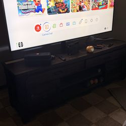 TV and Stand for the TV