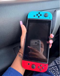 🎮 Nintendo Switch with Red & Blue Joy-Cons