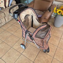 Dog stroller leopard print.