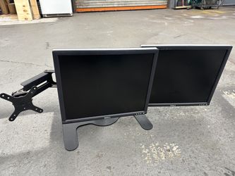 triple monitor stand with two monitors