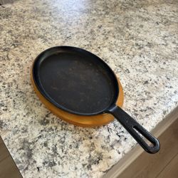 Cast Iron Skillet On Serving Board