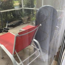 2 red patio chairs
