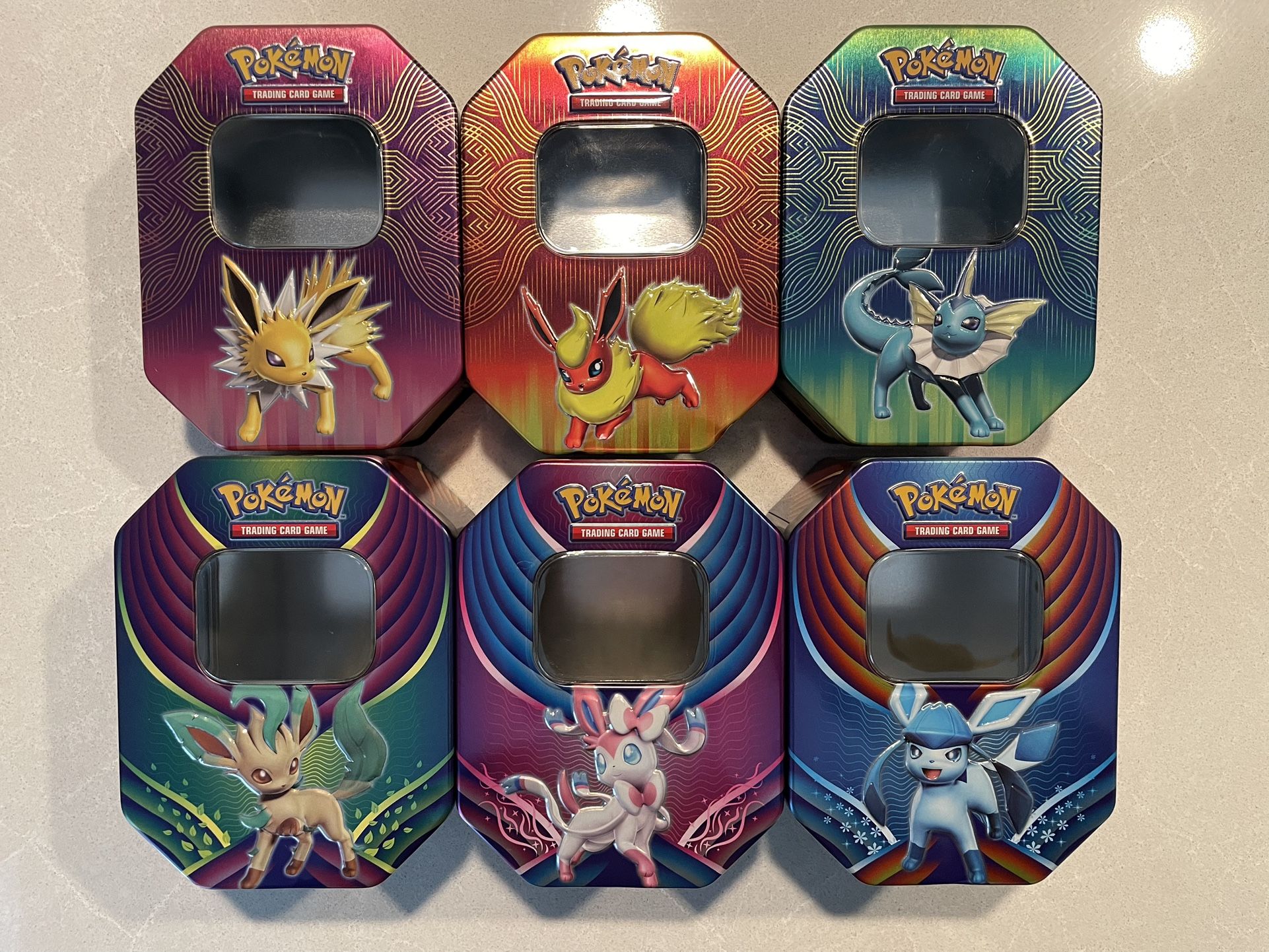 Eeveelution GX Tins *EMPTY* Elemental Power Evolution Celebration Pokemon Eevee Flareon Vaporeon Jolteon Glaceon Sylveon Leafeon