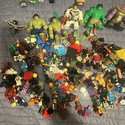 Lego marvel figures and bin 150$