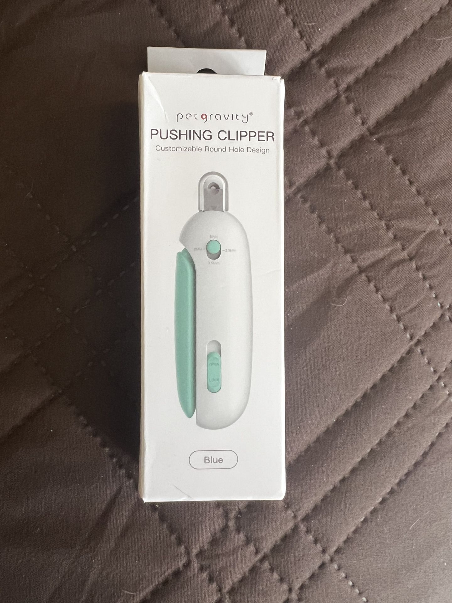 Cat Pushing Clippers & Hidden Nail File