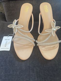 New with tags women’s bling heels size 10