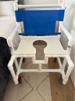 Rolling shower chair