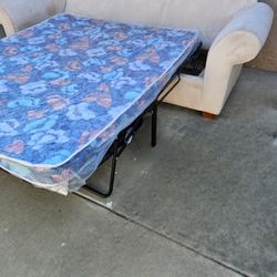 COUCH WITH PULL OUT BED 