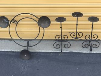 Two beautiful black metal candleholders