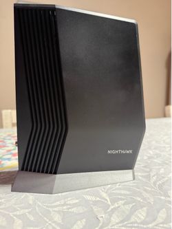 Netgear Nighthawk CAX80 (WiFi 6 Cable Modem Router)