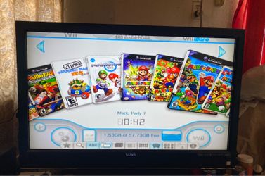 NINTENDO WII with 33 WII and GAMECUBE GAMES INSTALLED