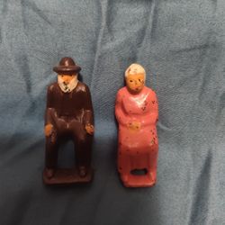 Vintage 1930's Iron Man And Woman Sitting