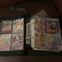 Pokémon cards real and fake with charmander binder