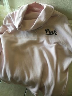 Pink original sweater used already / size large