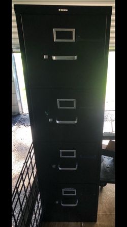 4 Drawl Filing Cabinet Full Of Filing Folders
