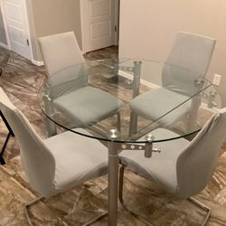 MOVING OPPORTUNITY! Unique Round Glass Table With 4 +2 Chairs