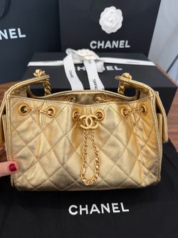 Chanel 25 mini gold caviar leather